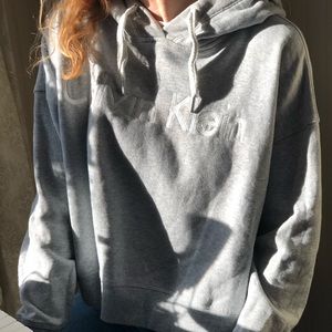 a gently used soft grey Calvin Klein hoodie